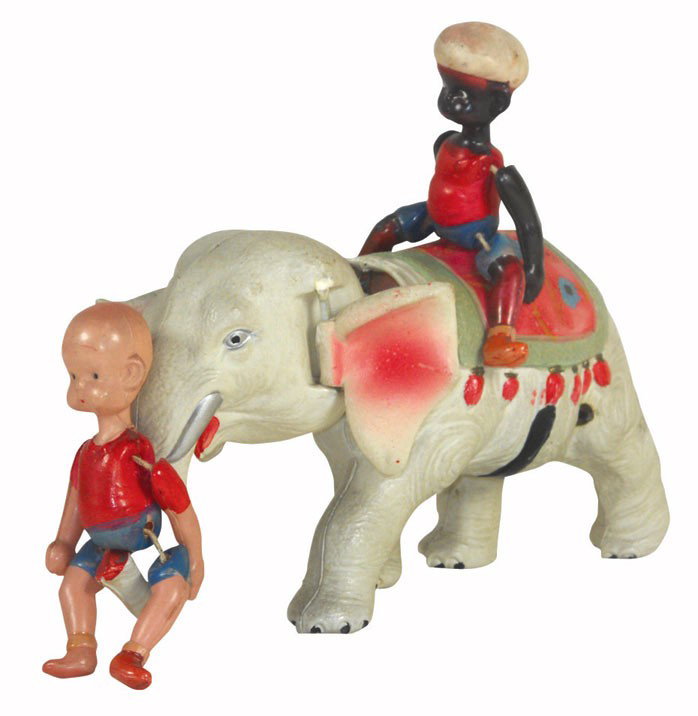 Toy, Henry on elephant w/Mahout, celluloid, back of Hen: Toy, Henry on elephant w/Mahout, celluloid, back of Henry's head is dented, o/wise in Exc cond, 6.25"H x 8.5"L.