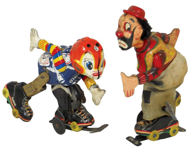 Toys (2), litho on tin wind-up walkers, hobo has real c: Toys (2), litho on tin wind-up walkers, hobo has real cloth pants & other advertises dishwashing detergent, product of Canada, pants on hobo soiled & slightly torn o/wise VG cond, 6.26"H.
