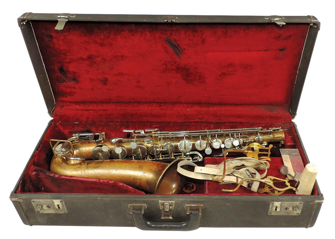 Musical Instrument, Aristocrat Saxophone, mfgd by Buescher, Mod. S-33, Ser. #397714, brass &: Musical Instrument, Aristocrat Saxophone, mfgd by Buescher, Mod. S-33, Ser. #397714, brass & nickel-plate, c.1963, Good cond, noting worn finish dings & missing pads, in fitted Buescher case 24"L.