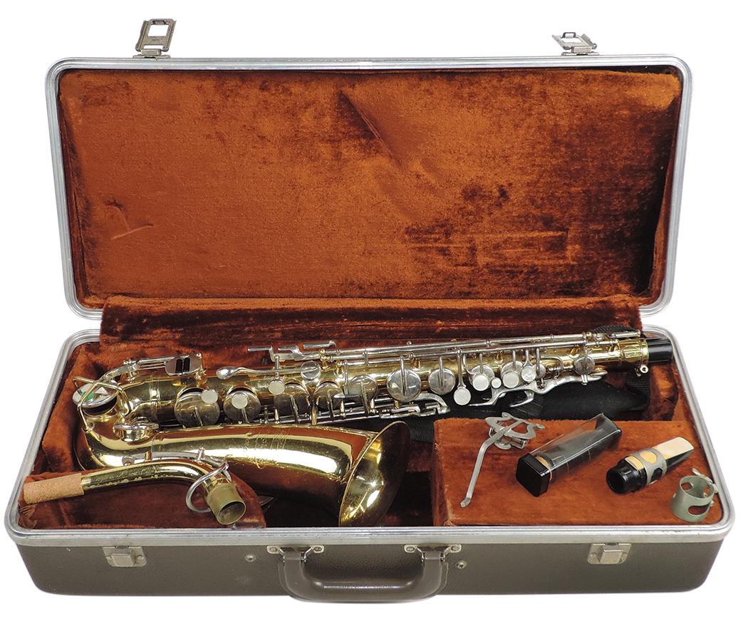 Musical Instrument, Aristocrat alto saxophone, mfgd by Buescher, Mod. S-33, Ser. # 542117, brass &: Musical Instrument, Aristocrat alto saxophone, mfgd by Buescher, Mod. S-33, Ser. # 542117, brass & nickel-plate, c.1970s, 26"L w/4.625" bell, VG+ untested cond, likely refurbished, in fitted Buescher 