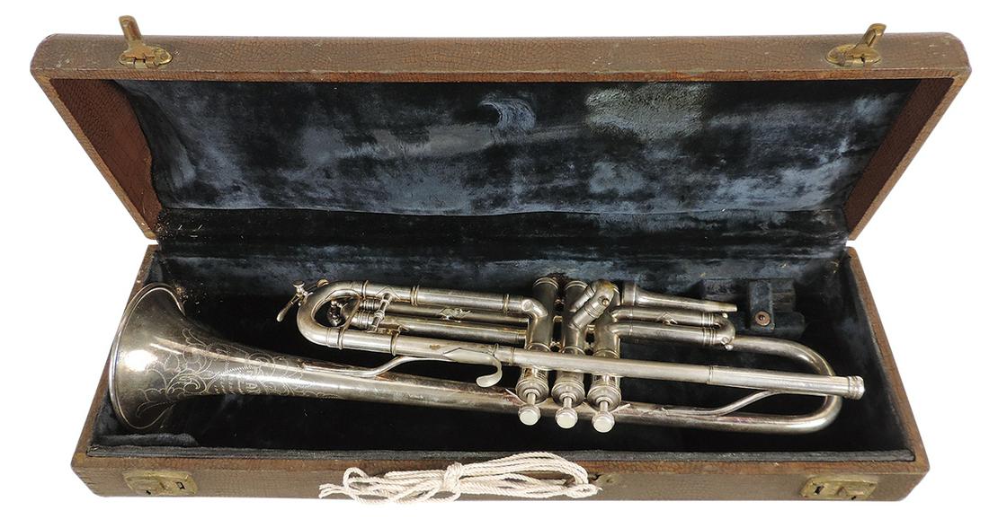 Musical Instrument, Dansant trumpet, mfgd by Martin, Ser. #70469, silver-plated brass, c.1926, 19"L: Musical Instrument, Dansant trumpet, mfgd by Martin, Ser. #70469, silver-plated brass, c.1926, 19"L excl mouthpiece, 4.25" bell, VG+ untested cond w/some brass showing at valves, in case 21"L.
