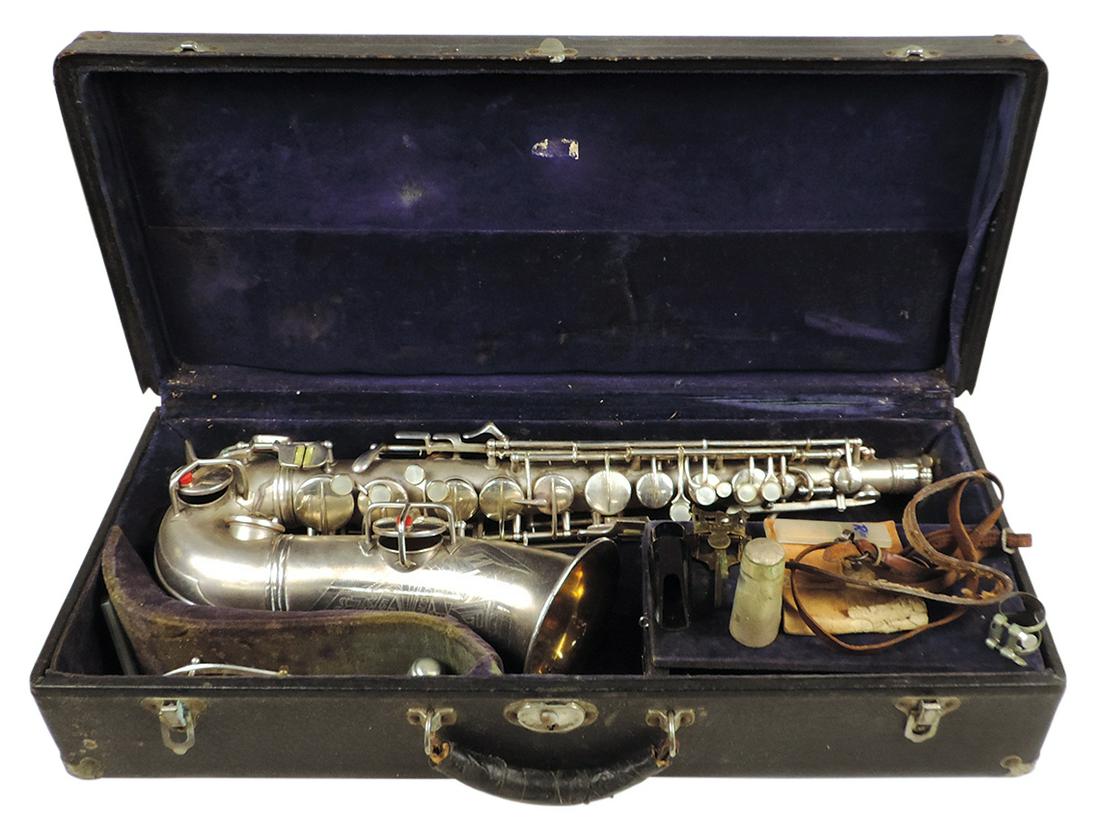 Musical Instrument, alto saxophone, mfgd by Conn, Ser. #M242902, silver-plated brass, c.1930, 25"L: Musical Instrument, alto saxophone, mfgd by Conn, Ser. #M242902, silver-plated brass, c.1930, 25"L w/4.75" bell, VG+ untested cond, likely later refurbished, noting some damage to bottom tone hole cov