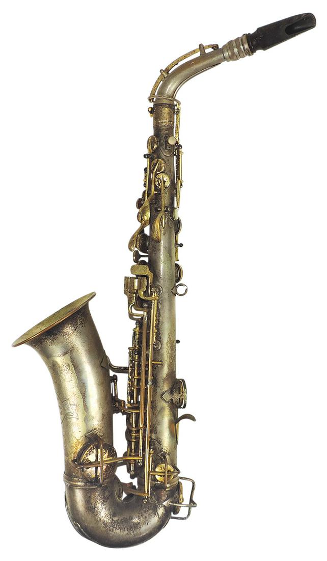 Musical Instrument, alto saxophone, mfgd by Conn, Ser. #187548, silver-plated brass w/gold-plated: Musical Instrument, alto saxophone, mfgd by Conn, Ser. #187548, silver-plated brass w/gold-plated keys & tone hole covers, c.1925, 25"L w/4.75" bell, Fair cond w/no case.