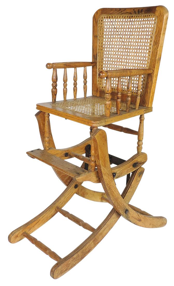 Child's Combination Highchair/Rocker, oak w/caned seat & back, VG cond, 25.5"H (collapsed).: Child's Combination Highchair/Rocker, oak w/caned seat & back, VG cond, 25.5"H (collapsed).