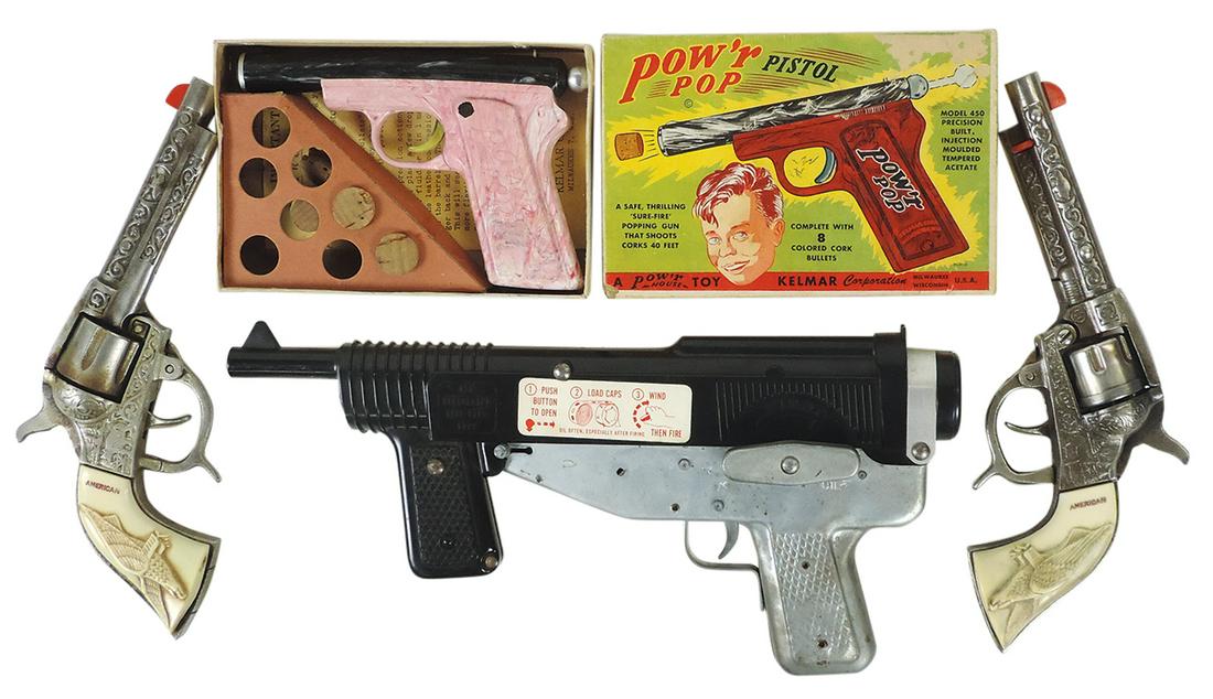 Toy Cap Guns (4), Mattel windup machine gun, pr cast iron "American" six shooters by Kilgore & MIB: Toy Cap Guns (4), Mattel windup machine gun, pr cast iron "American" six shooters by Kilgore & MIB Power Pop Gun by Kelmar, all VG+ working cond except latter, largest 13"L.