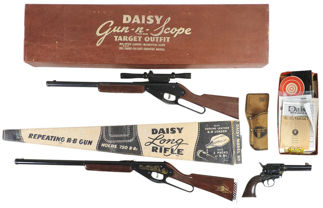 Air Rifles (3), all mfgd by Daisy, Mod. 80 Long Rifle, Exc (not working) cond in box, Mod. 75 Scout: Air Rifles (3), all mfgd by Daisy, Mod. 80 Long Rifle, Exc (not working) cond in box, Mod. 75 Scout w/scope, Good+ (not working) cond in Red Ryder w/scope box & bb pistol (Good+ not working cond) in a