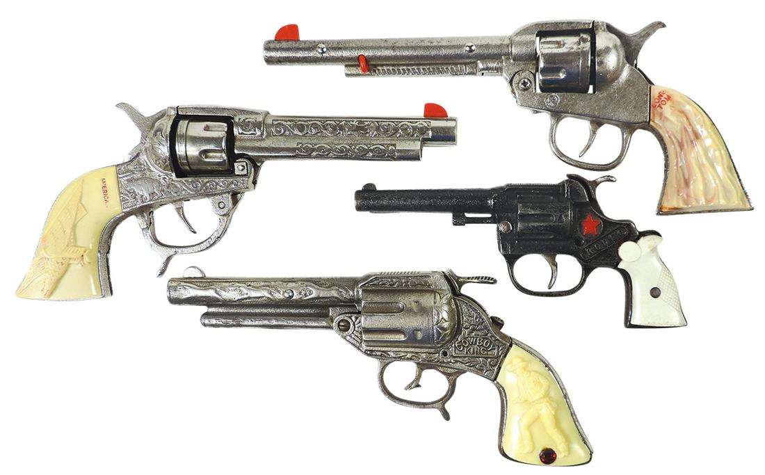 Toy Cap Pistols (4), mfgd by Kenton & Stevens, Long Tom, American, Cowboy King & Rodeo, cast iron,: Toy Cap Pistols (4), mfgd by Kenton & Stevens, Long Tom, American, Cowboy King & Rodeo, cast iron, VG working cond, largest 11"L.