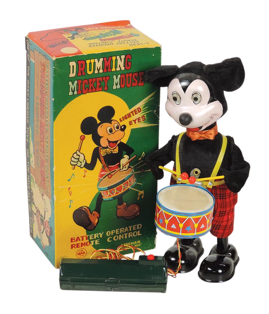 Toy, Drumming Mickey Mouse w/box, mfgd by Linemar for Walt Disney Productions, B-O, remote control: Toy, Drumming Mickey Mouse w/box, mfgd by Linemar for Walt Disney Productions, B-O, remote control w/lighted eyes, MIB working cond, 11"H.