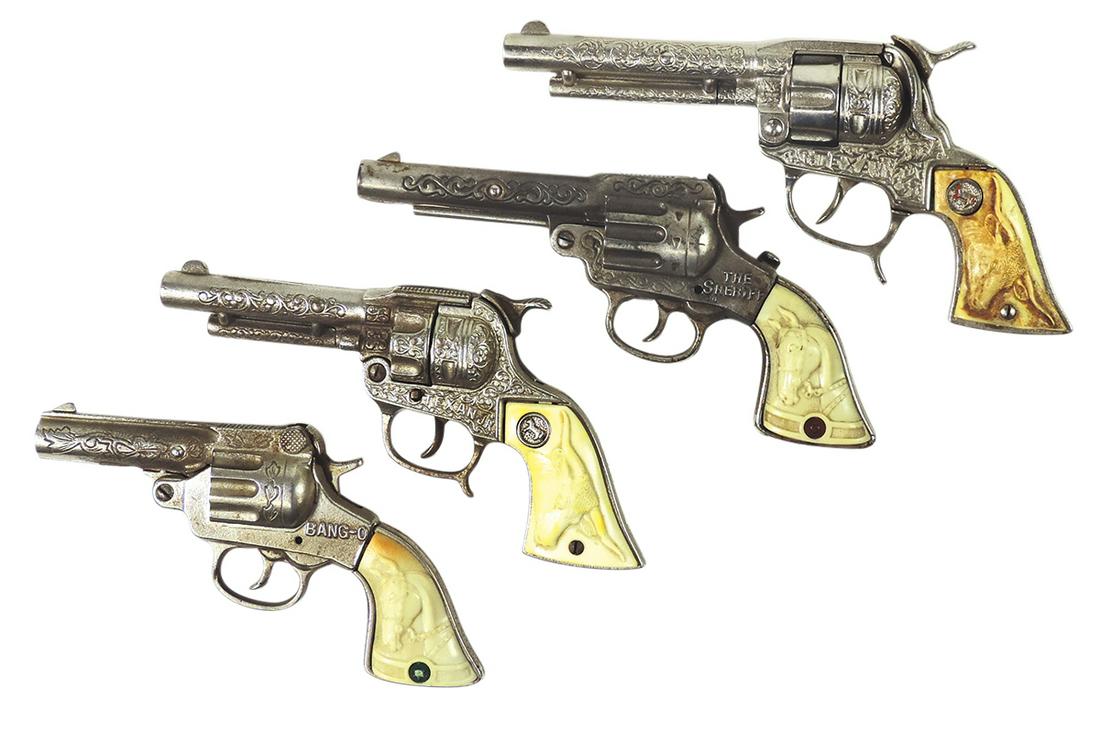 Toy Cap Pistols (4), mfgd by Nichols, includes Sheriff, Texan Jr & Bang-O, cast iron, VG working: Toy Cap Pistols (4), mfgd by Nichols, includes Sheriff, Texan Jr & Bang-O, cast iron, VG working cond, largest 10.25"L.