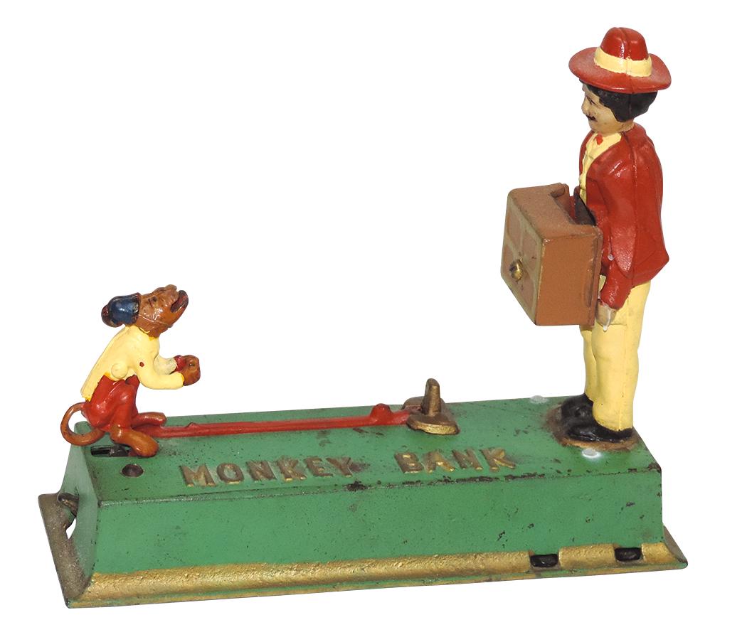 Mechanical Bank, Monkey & Organ Grinder, mfgd by Hubley, cast iron, c.1920s, Exc working cond w/prof: Mechanical Bank, Monkey & Organ Grinder, mfgd by Hubley, cast iron, c.1920s, Exc working cond w/prof repaint, no key, 8.5"L.