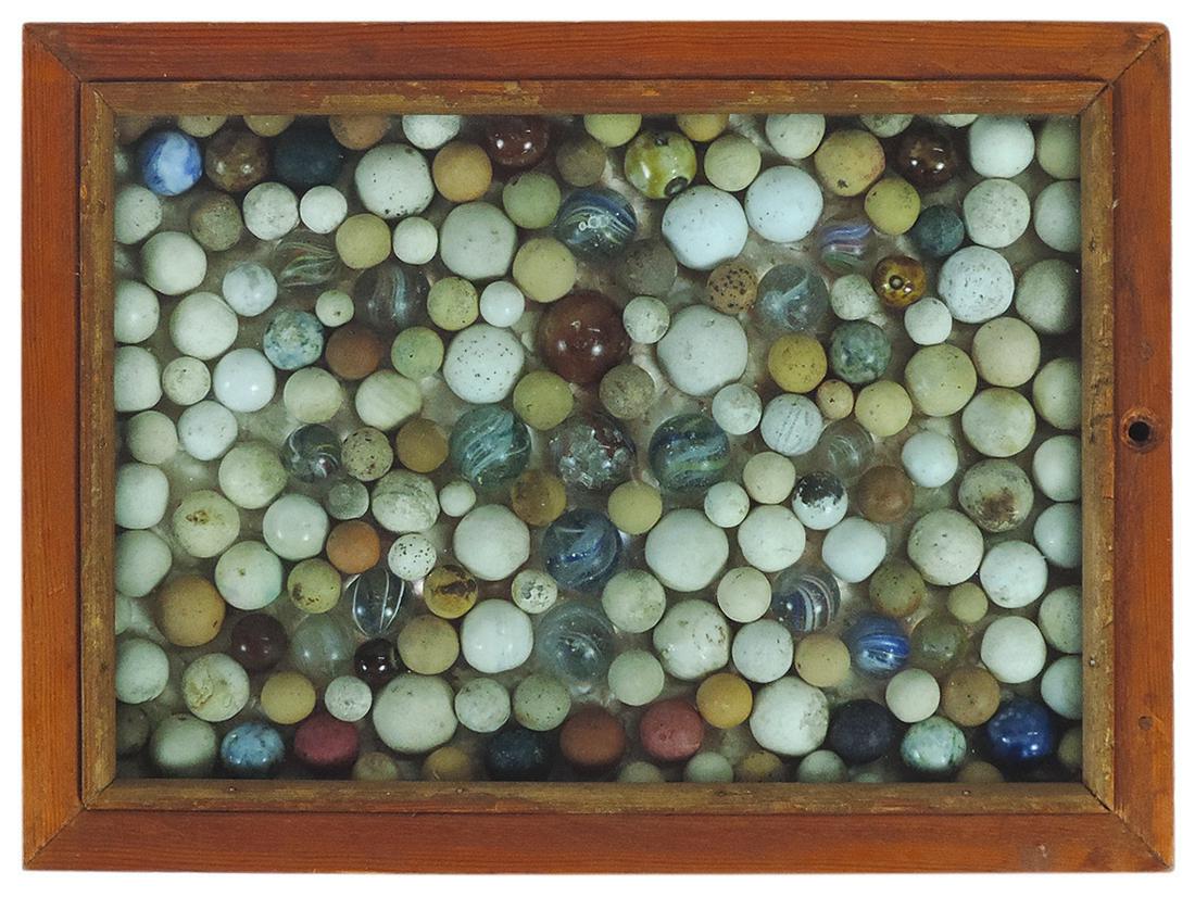 Toy Marbles, wood framed display of approx 170 clay, Bennington, and some core swirls, various cond,: Toy Marbles, wood framed display of approx 170 clay, Bennington, and some core swirls, various cond, 8.5"H x 11"W.