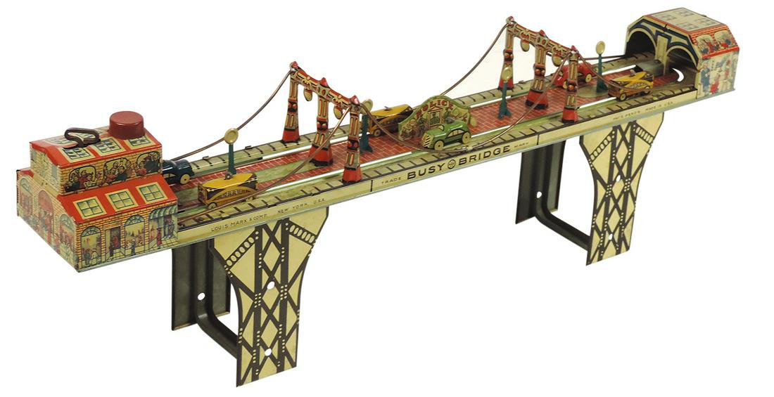 Toy Busy Bridge, mfgd by Marx, incl 6 cars & buses, litho on tin windup, Exc working cond, 24"L. (1 of 2)
