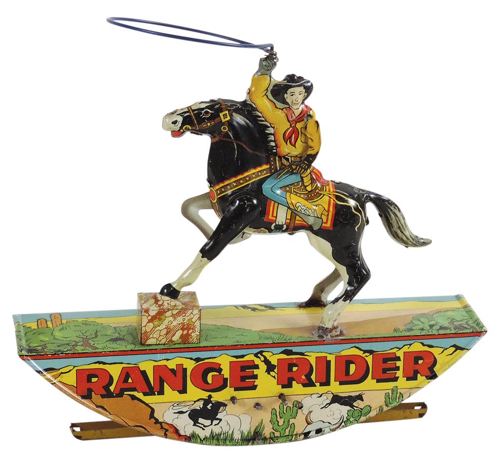 Toy Range Rider, mfgd by Marx, w/rocking action & twirling lariat, litho on tin windup, VG+ cond, (1 of 2)