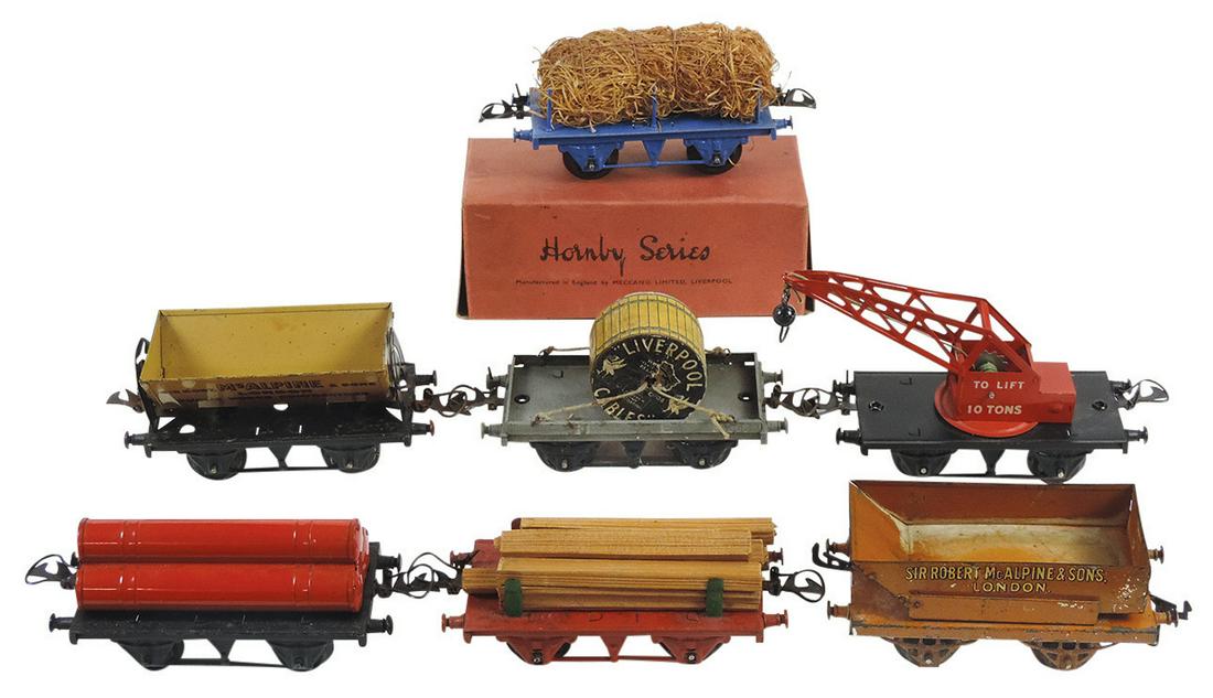 Toy Work Train Cars (7), mfgd by Hornby, cable spool, side dump, end dump, timber, sewer pipe, crane (1 of 1)