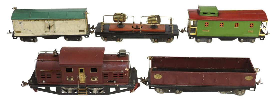 Toy Electric Train Set (5), Lionel pre-war standard ga, w/380 loco, 514R, 517, 212 cars &: Toy Electric Train Set (5), Lionel pre-war standard ga, w/380 loco, 514R, 517, 212 cars & searchlight, pressed steel, Good+ to VG untested cond, noting 1 light housing absent from loco, largest 13"L.