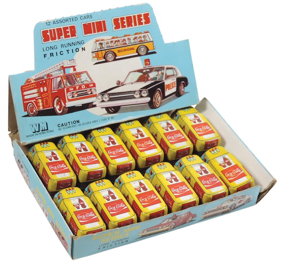 Coca-Cola Super Mini Series Friction Delivery Trucks (12), in orig display box, Rare, colorful litho (1 of 2)
