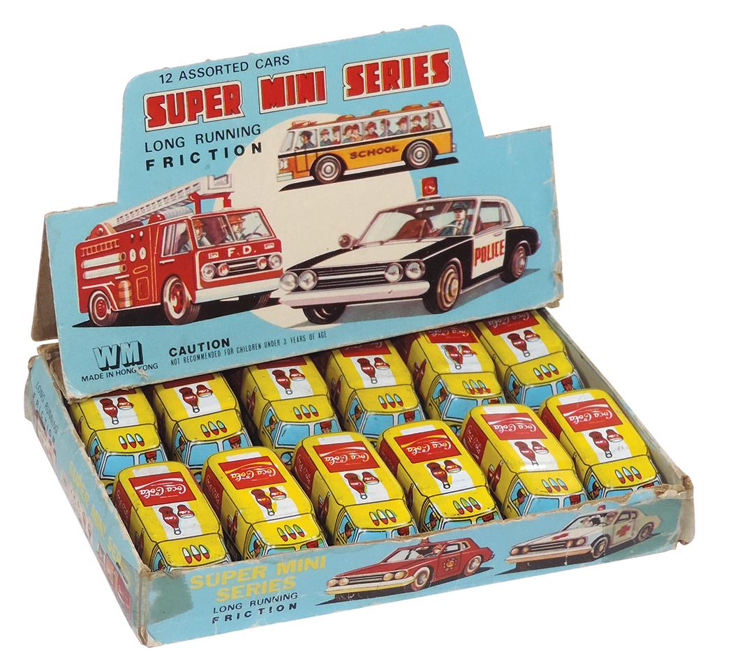 Coca-Cola Super Mini Series Friction Delivery Trucks (12), in orig display box, Rare, colorful litho: Coca-Cola Super Mini Series Friction Delivery Trucks (12), in orig display box, Rare, colorful litho on tin by WM-Hong Kong, c.1970's, trucks in Exc cond, display box has taped corners & some rough ed