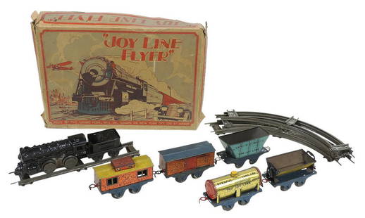 Toy Joy Line Boxed Train Set (7 pcs), mfgd by Girard Model Works, w/dump cart plus track, cast iron: Toy Joy Line Boxed Train Set (7 pcs), mfgd by Girard Model Works, w/dump cart plus track, cast iron & litho on tin windup, 10" x 15"W.