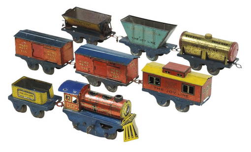 Toy Joy Line Train (8 pcs), mfgd by Girard Model Works, windup loco, tender & 6 cars, litho on tin,: Toy Joy Line Train (8 pcs), mfgd by Girard Model Works, windup loco, tender & 6 cars, litho on tin, Good to VG working cond, largest 6"L.