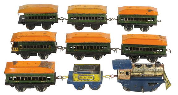 Toy Joy Line Train Cars (9), mfgd by Girard Model Works, windup loco, tender & 7 pass cars, litho on: Toy Joy Line Train Cars (9), mfgd by Girard Model Works, windup loco, tender & 7 pass cars, litho on tin, Good to VG working cond, largest 6"L.