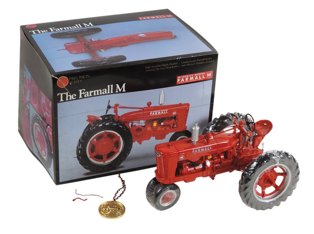 Toy Tractor, Model Farmall M, mfgd by Precision Models, die-cast, MIB, 10.25"L. (1 of 1)