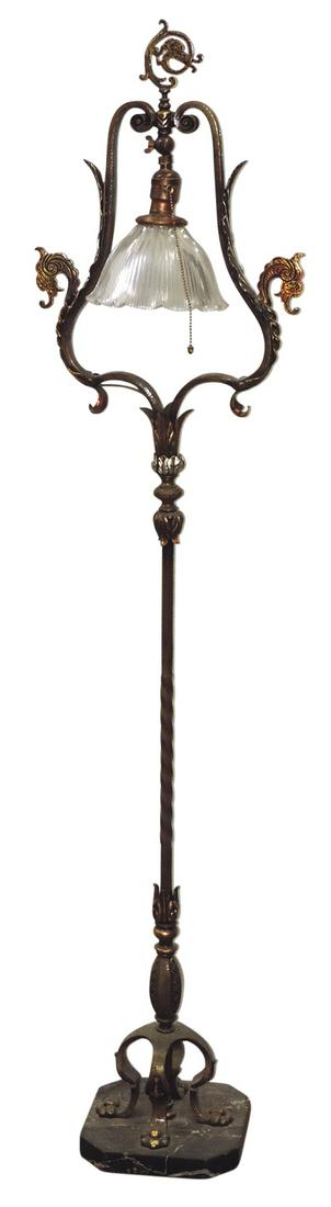 Lighting, wrought iron floor lamp w/harp-shaped frame & griffin heads suspending a pressed glass (1 of 2)