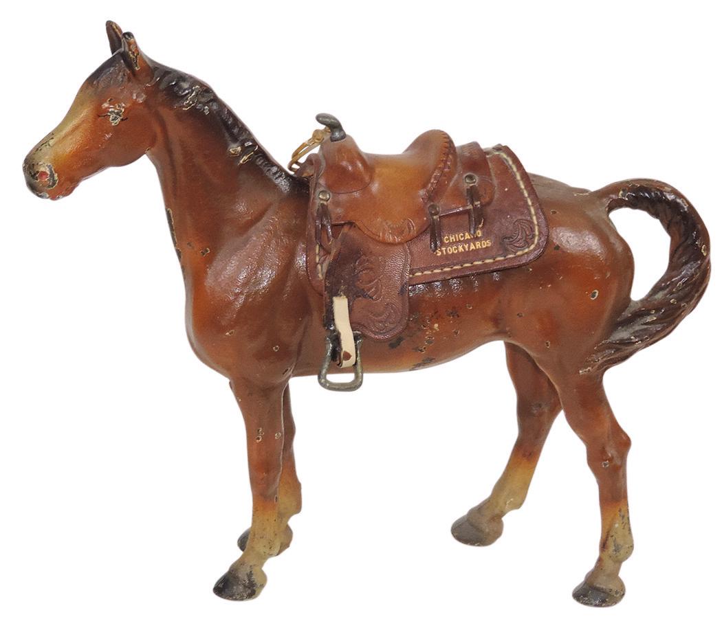 Livestock Souvenir, horse doorstop, mfgd by Hubley, cast iron, w/tooled leather saddle imprinted (1 of 2)