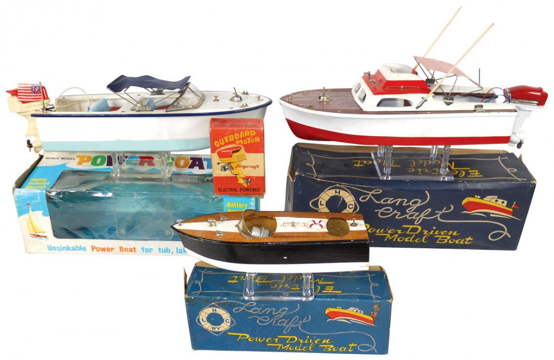 Toy boats (3), Langcraft & Union wood & plastic m: Toy boats (3), Langcraft & Union wood & plastic models, all battery powered w/boxes, 2 w/Langcraft outboard motors, boats in Exc cond, boxes vary, 10" to 13"L.