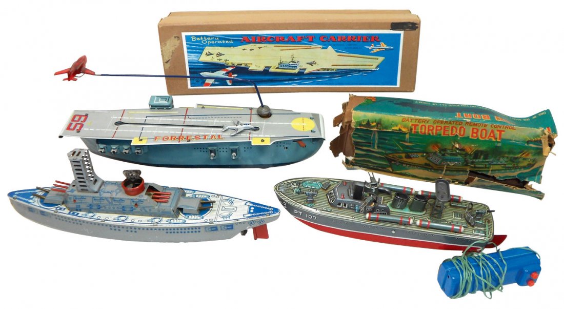 Toy boats (3), Line Mar torpedo boat, remote cont: Toy boats (3), Line Mar torpedo boat, remote controlled, Exc w/poor box, Japanese tin keywind destroyer, VG cond & Forrestal Aircraft Carrier, battery powered w/Line Mar box, Exc cond, 11" to 15"L.
