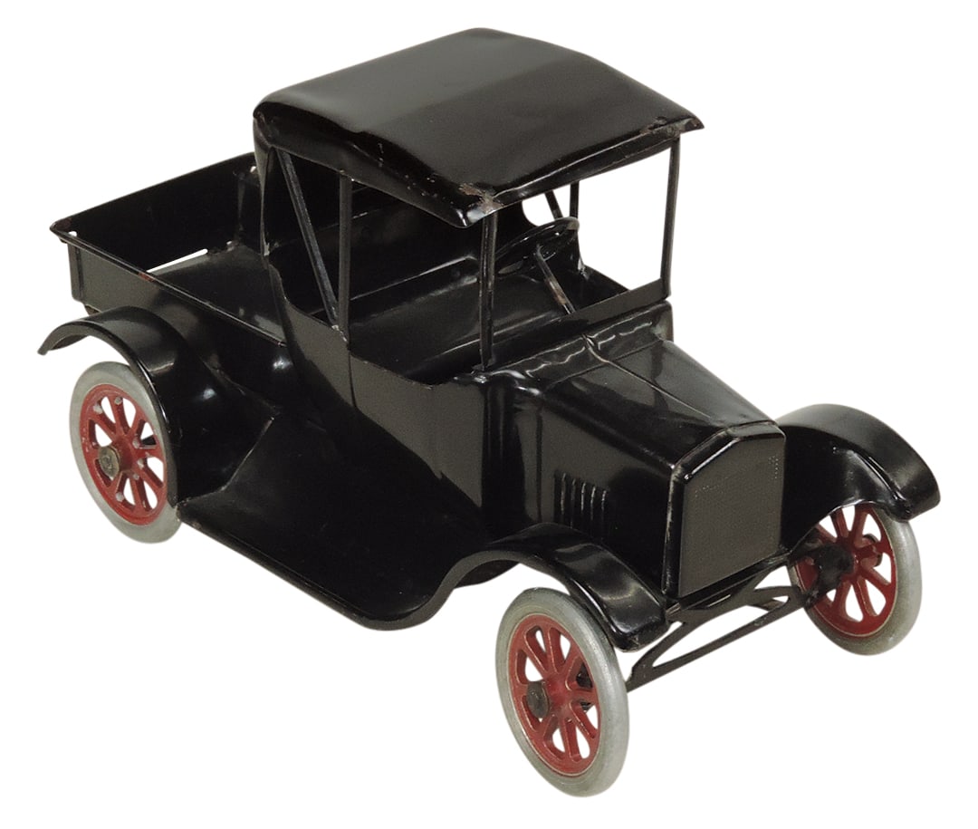 Toy Truck, Buddy L Flivver Ford Pickup No. 210, pressed steel, mfgd by Moline Pressed Steel Co.,: Toy Truck, Buddy L Flivver Ford Pickup, No. 210, pressed steel, mfgd by Moline Pressed Steel Co., Exc+ orig cond w/minor paint loss on roof, orig decal underneath, 12"L.