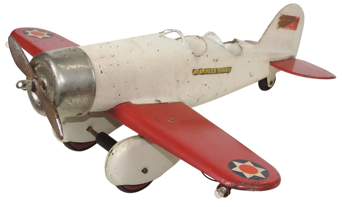 Toy Airplane, Steelcraft Lockheed Sirius two-seater, pressed steel w/B-O lights, c.1935, VG cond,: Toy Airplane, Steelcraft Lockheed Sirius two-seater, pressed steel w/B-O lights, c.1935, VG cond, 22"L x 22"Wingspan.