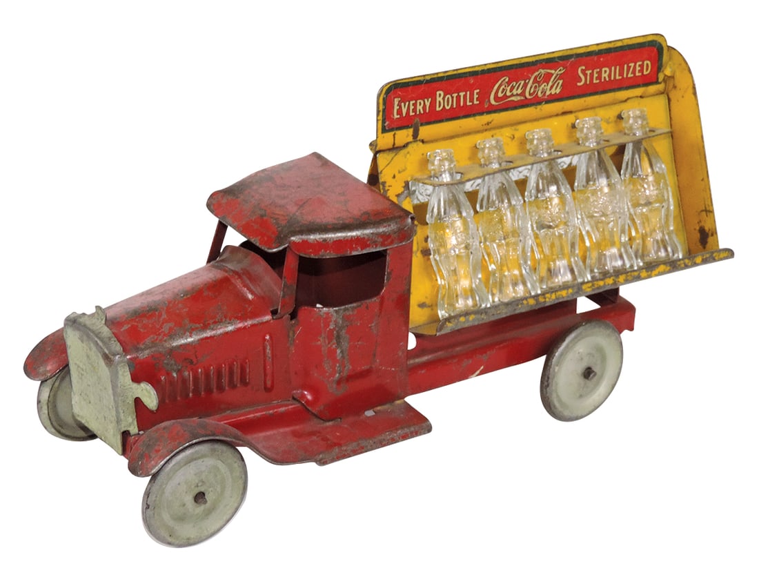 Toy Coca-Cola Delivery Truck, mfgd by Metalcraft w/10 miniature bottles, pressed steel, VG cond: Toy Coca-Cola Delivery Truck, mfgd by Metalcraft w/10 miniature bottles, pressed steel, VG cond w/scattered paint wear, 11"L.