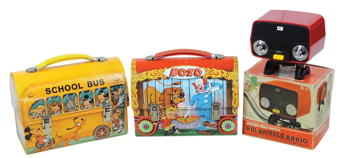Lunchboxes & Radio (3), Disney Mickey Mouse lunchbox w/thermos & Bozo lunchbox w/out thermos, both: Lunchboxes & Radio (3), Disney Mickey Mouse lunchbox w/thermos & Bozo lunchbox w/out thermos, both by Aladdin & an Archer Road Patrol Bicycle Radio, untested MIB, both lunchboxes in Exc cond, largest 