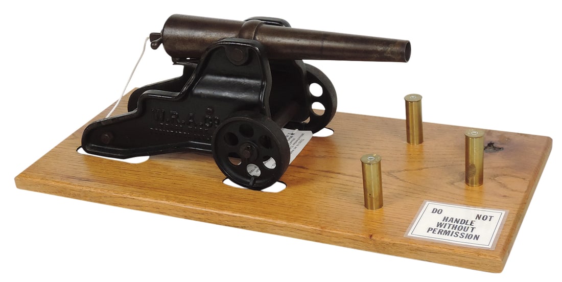 Firearm, Signal Canon, cast iron breach loader, mfgd by Winchester Repeating Arms, Model No. 1898: Firearm, Signal Canon, cast iron breach loader, mfgd by Winchester Repeating Arms, Model No. 1898 w/12" 10 Ga barrel, c.1908, VG+ untested cond w/finish wear to barrel & mounted on later display w/3 a