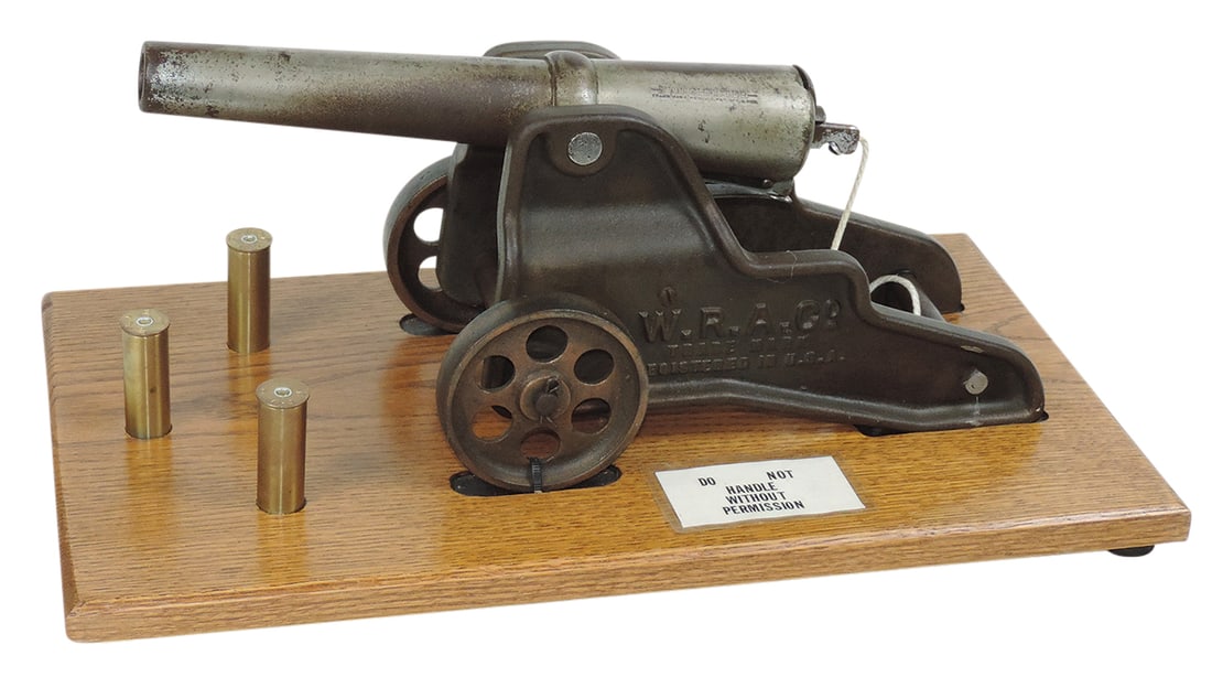 Firearm, Signal Canon, cast iron breach loader, mfgd by Winchester Repeating Arms, Model No. 1898: Firearm, Signal Canon, cast iron breach loader, mfgd by Winchester Repeating Arms, Model No. 1898 w/12" 10 Ga barrel, c.1908, VG+ untested cond retaining much orig barrel finish & mounted on later dis