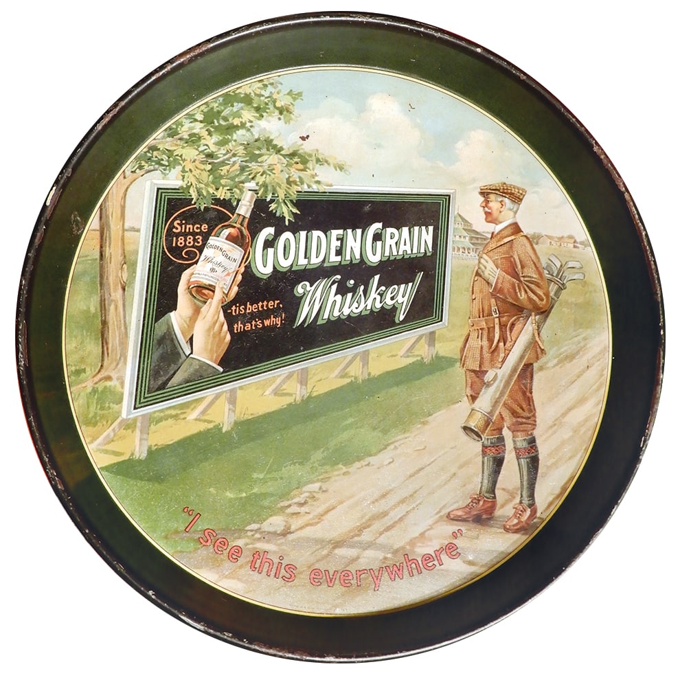 Breweriana Tray, Golden Grain Whiskey, litho on tin w/golfing scene, mfgd by Chas. Shonk, VG+ cond: Breweriana Tray, Golden Grain Whiskey, litho on tin w/golfing scene, mfgd by Chas. Shonk, VG+ cond w/some wear to rim, 12"Dia.