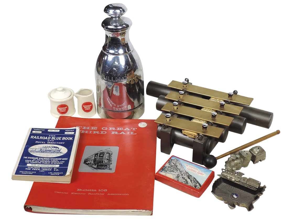 Railroad Collectibles (8), Pullman insulated jug by Stanley, 4-chime dinner bell, Mo. Pacific Cream: Railroad Collectibles (8), Pullman insulated jug by Stanley, 4-chime dinner bell, Mo. Pacific Cream & Sugar, Electric Rail Fans Bulletin 105, playing cards & other items, VG to Exc cond, largest 11"H.