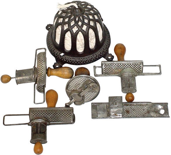 Nutmeg graters (5) & cast iron string holder; 3 Edg: Nutmeg graters (5) & cast iron string holder; 3 Edgar's, pat. 1896,1 Boye, very unusual unmarked rotary & ornate cast iron string holder w/holes in feet for mounting to counter, all VG condition, 4"-6