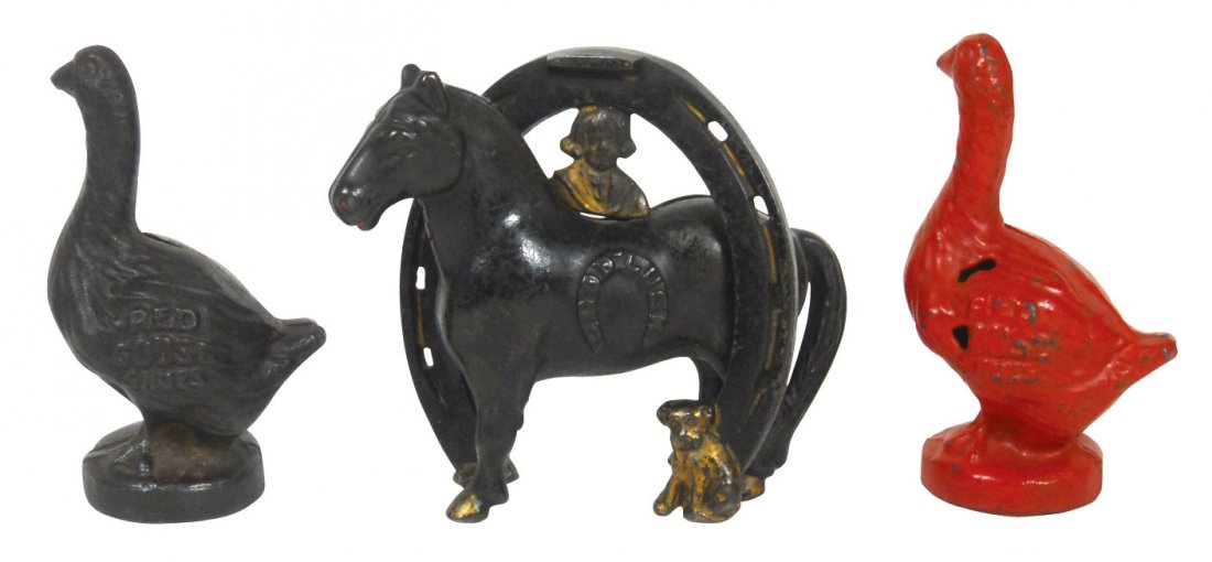 Still banks (3), Good Luck Horseshoe w/Buster Bro: Still banks (3), Good Luck Horseshoe w/Buster Brown & Tige, Arcade US 1908-1932, 4.25" H & 2 Red Goose Shoes on bases, one red paint, one not painted, 4.25"H, Arcade US, all cast iron, VG/Exc cond.