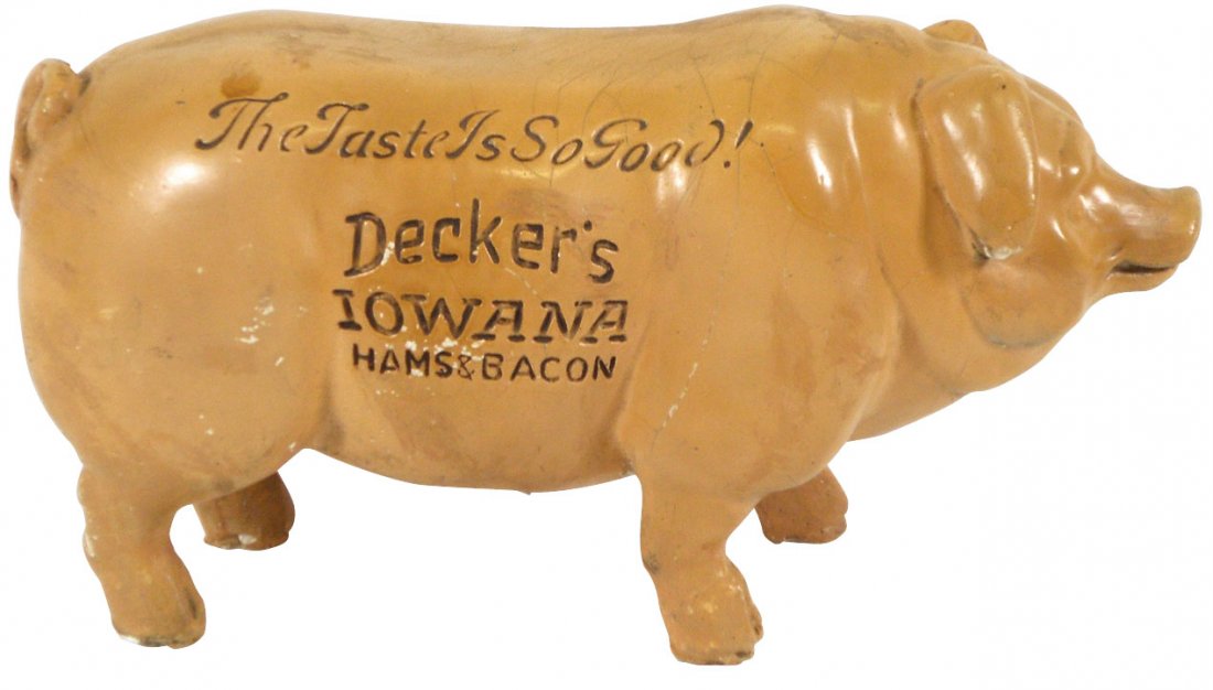 Advertising figure for Decker's Iowana Hams & Bac: Advertising figure for Decker's Iowana Hams & Bacon, plaster pig, "The Taste Is So Good!", Rare larger size, VG cond w/minor losses, 7.5"H x 13.5"L.