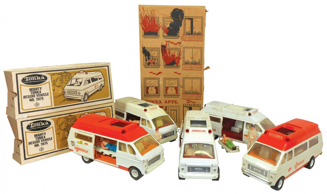 Toy Fire Trucks (6), Tonka, 3 ambulances, all whi: Toy Fire Trucks (6), Tonka, 3 ambulances, all white, paint Good to Exc, 2 Rescue trucks, orange tops, paint Good, patient accessories for all, 18"L & Fire Dept. empty box, some end damage, Good overal
