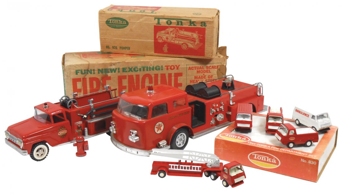 Toy Fire Engines (7), Texaco Fire Chief w/Good bo: Toy Fire Engines (7), Texaco Fire Chief w/Good box, no ladder, hoses & Exc paint, Tonka 926 pumper, Fair box, hoses/ladders good, some paint wear & Tiny Tonka trucks, MIB, box discolored, 13" to 25"L.