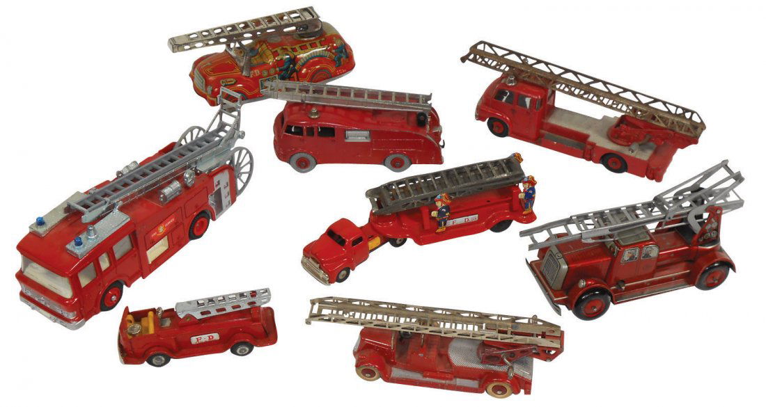 Toy Fire Engines (8), 2 pressed steel ladder truc: Toy Fire Engines (8), 2 pressed steel ladder trucks, 2 tinplate Japan friction & 4 DC Dinky trucks, all VG cond, 4" to 8"L.
