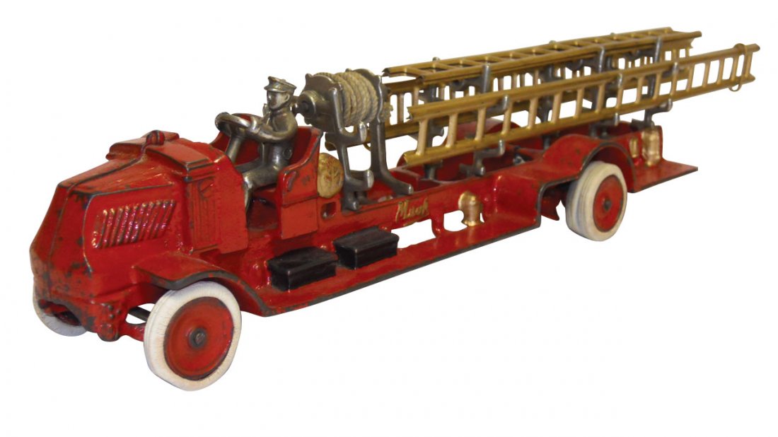 Toy, Arcade Mack Ladder Truck w/driver & ladders,: Toy, Arcade Mack Ladder Truck w/driver & ladders, cast iron, tires in good shape, Exc cond, 4.5"H x 18"L w/out ladders.