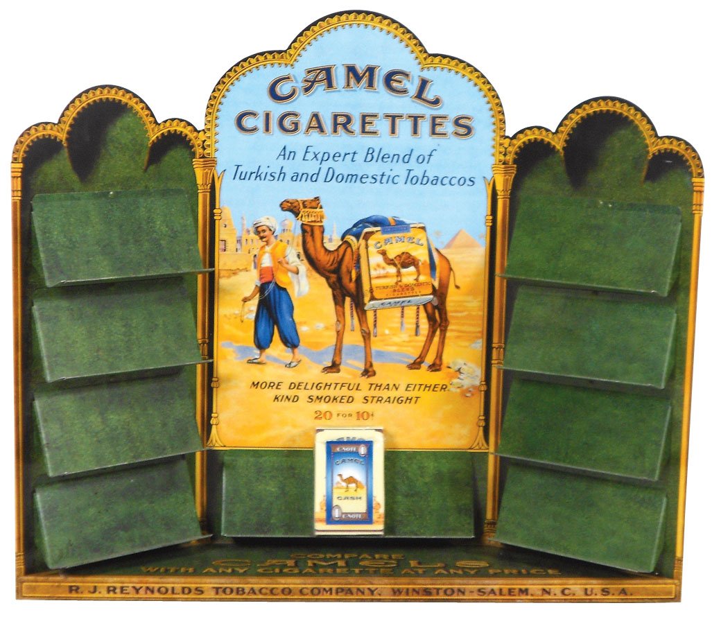 Camel Cigarettes counter display, contemporary, c: Camel Cigarettes counter display, contemporary, colorful die cut metal w/nice graphics, great for displaying cigarette packs, 18"H x 21.5"W.