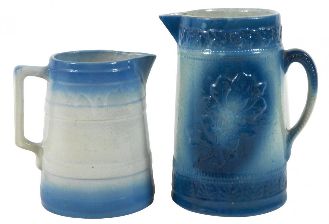 Stoneware pitchers (2), American Beauty Rose w/bl: Stoneware pitchers (2), American Beauty Rose w/blue-green glaze, beading on low applied handle, petals around top & bottom, roughness on tip of pour spout, o/wise great color & cond, 9"H & blue & whit