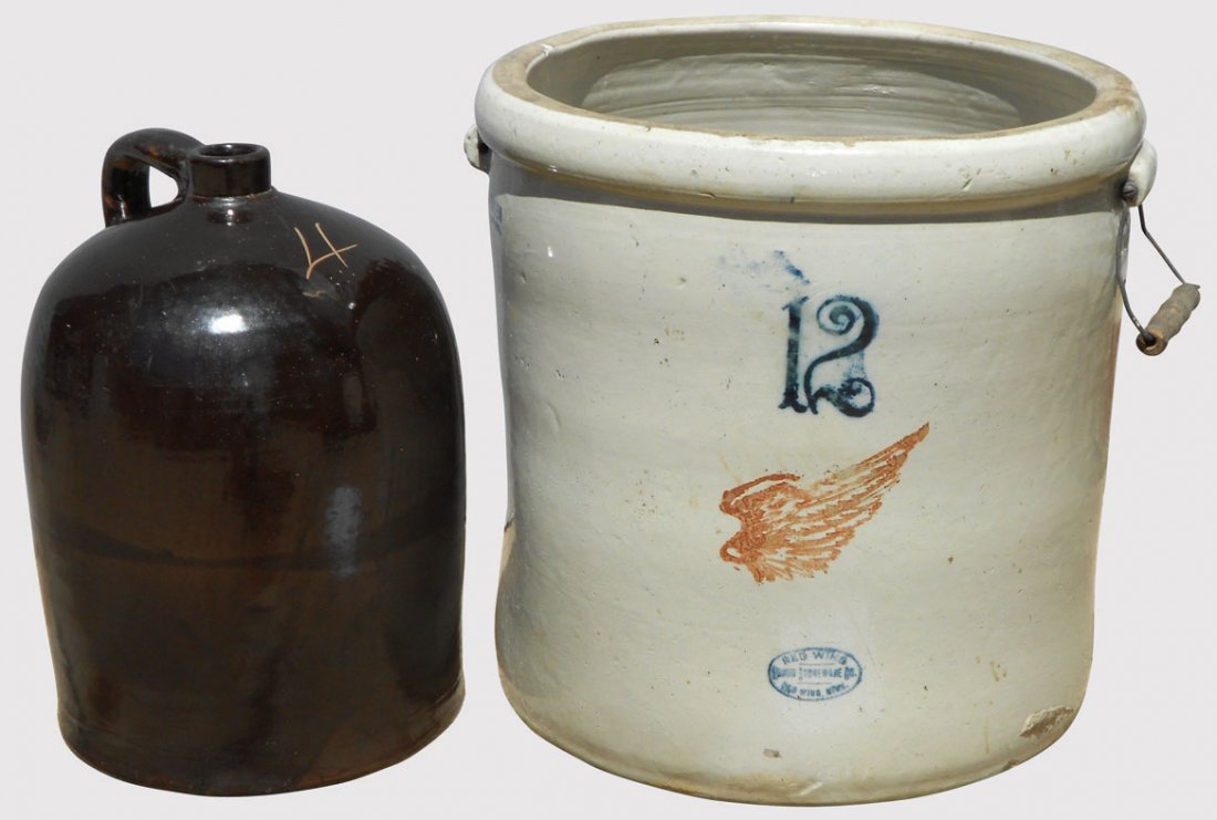 Stoneware crock & jug, Red Wing, 12-gal, slight b: Stoneware crock & jug, Red Wing, 12-gal, slight bottom roughness & missing one wire bail, o/wise VG cond & Red Wing Albany glaze 4 gal jug, Exc cond, 16"H.