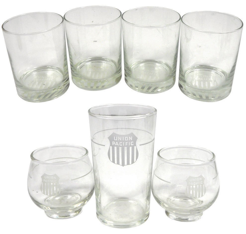 Railroad china & glassware, Union Pacific "Desert: Railroad china & glassware, Union Pacific "Desert Flower" cup & saucer, set of 4 Union Pacific rocks glasses, new in box, 3 smaller UP glasses & full box of Union Pacific stick matches, all Exc cond, 