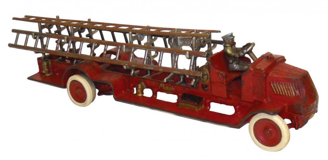 Toy Fire Truck, Mack Ladder Truck, cast iron, 3 l: Toy Fire Truck, Mack Ladder Truck, cast iron, 3 ladders, driver, bell underneath, VG to Exc orig cond, 5"H x 18"L.