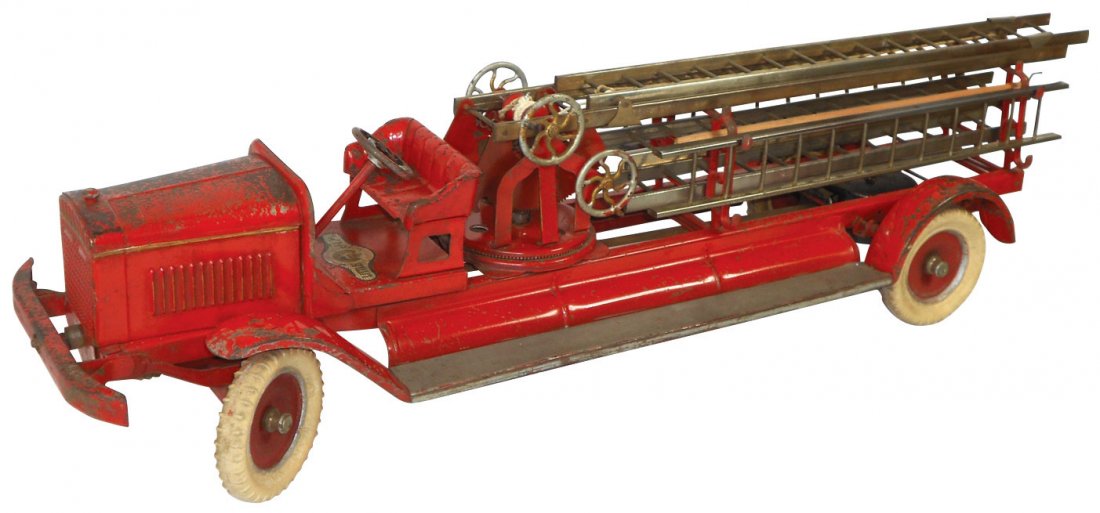 Toy Fire Truck, Kingsbury Little Jim, from J.C. P: Toy Fire Truck, Kingsbury Little Jim, from J.C. Penney Co., has ladders present, good running boards & bell under rear wheels, a great oldie in VG+ orig cond w/minor overall paint loss, 9"H x 31"L.